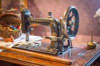Hand cranked embroidery machine.